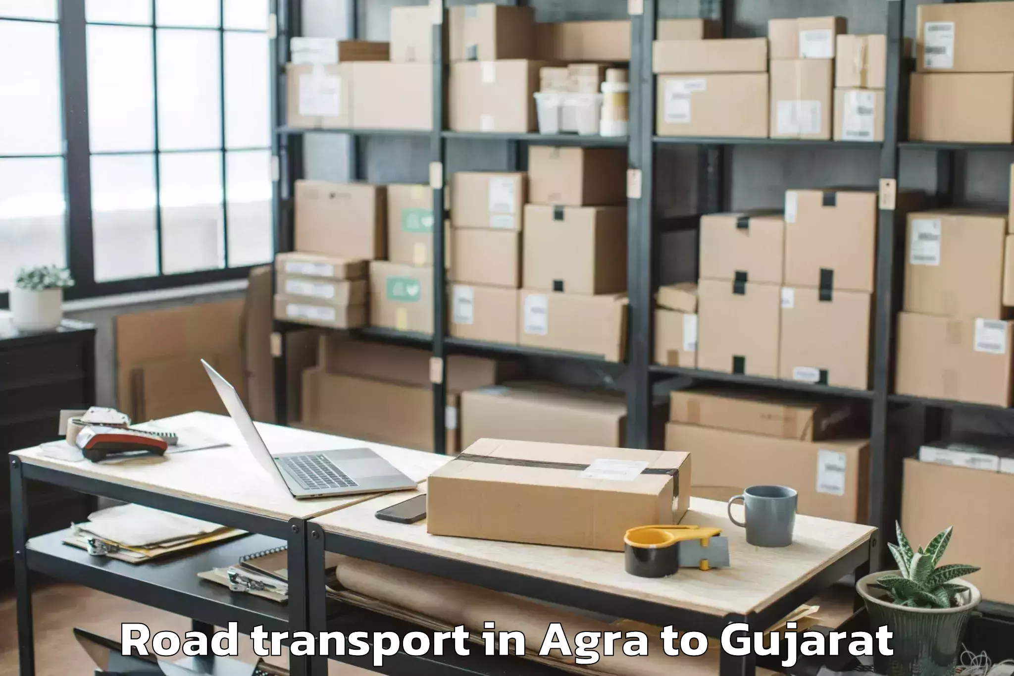 Top Agra to Crystal Mall Rajkot Road Transport Available